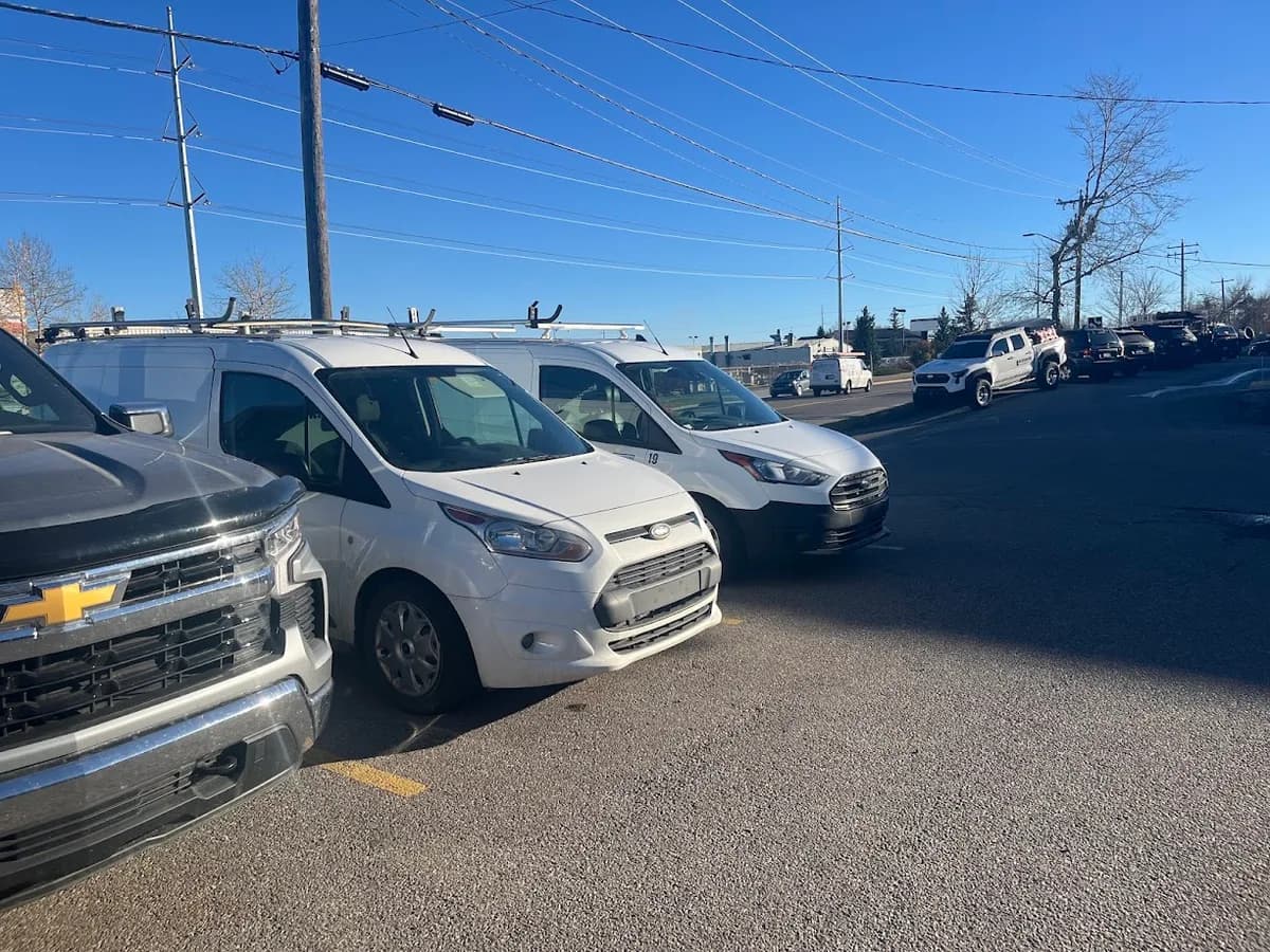 Pro-Pest Solutions fleet vehicles lined up in the lot